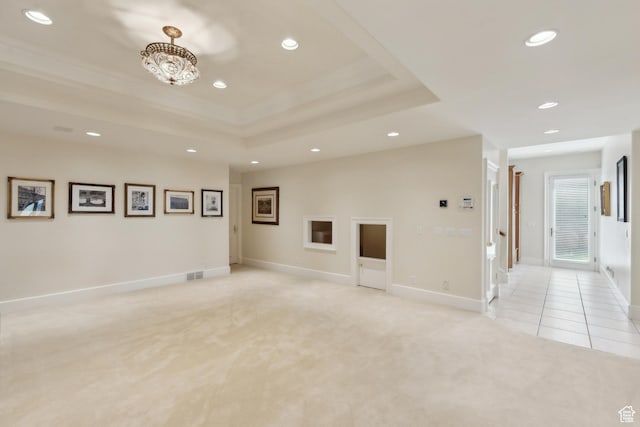 1714 Ridge Point Dr, Bountiful, UT 84010 - empty room featuring recessed lighting, visible vents, light colored carpet, and a tray ceiling