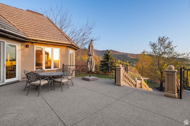 1714 Ridge Point Dr, Bountiful, UT 84010 - view of patio with a mountain view and outdoor dining area