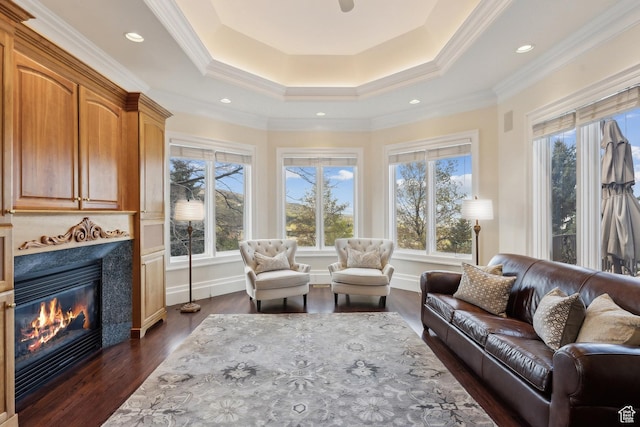 1714 Ridge Point Dr, Bountiful, UT 84010 - living room featuring a high end fireplace, crown molding, dark wood-style flooring, and a raised ceiling