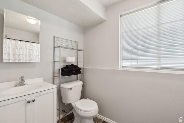 472 W 330 S, American Fork, UT 84003 - bathroom featuring baseboards, toilet, and vanity