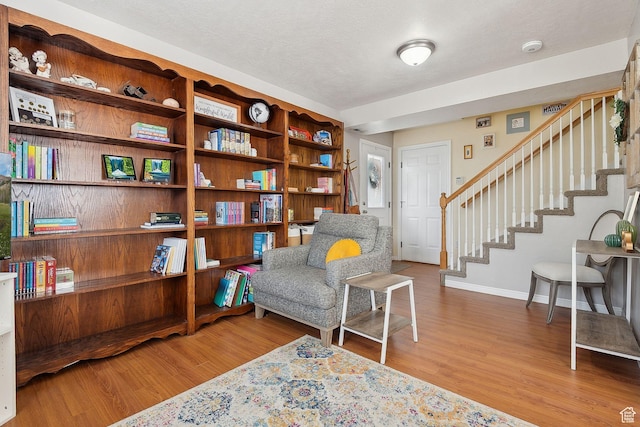 472 W 330 S, American Fork, UT 84003 - sitting room featuring stairway, wood finished floors, and baseboards