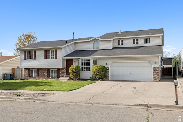 472 W 330 S, American Fork, UT 84003 - view of front of home with brick siding, fence, driveway, a front yard, and an attached garage