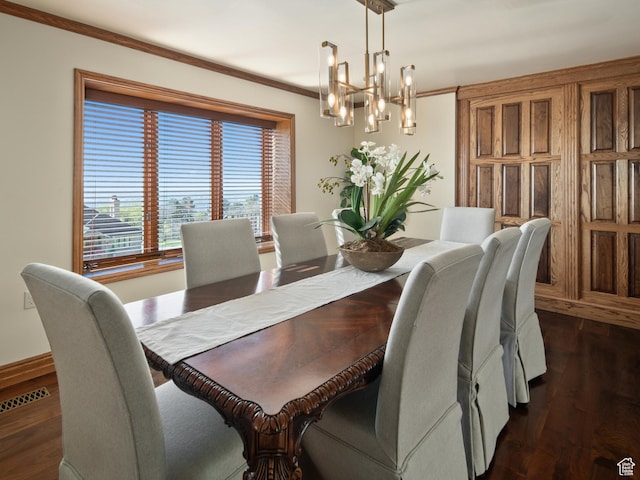 4120 S Beus Dr E, Ogden, UT 84403 - dining area featuring ornamental molding, baseboards, visible vents, a notable chandelier, and dark wood-type flooring