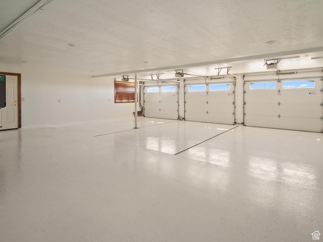 4120 S Beus Dr E, Ogden, UT 84403 - garage featuring a garage door opener
