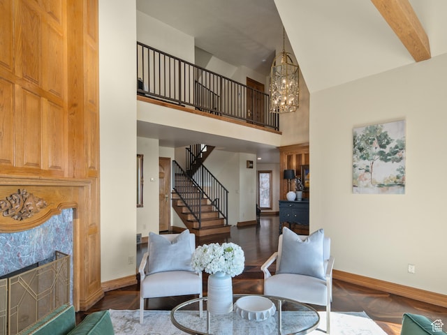 4120 S Beus Dr E, Ogden, UT 84403 - living room featuring baseboards, an inviting chandelier, a premium fireplace, high vaulted ceiling, and stairs