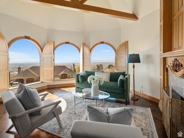 4120 S Beus Dr E, Ogden, UT 84403 - living room featuring a tiled fireplace, high vaulted ceiling, beam ceiling, and baseboards