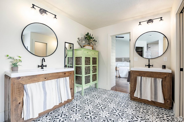 bathroom featuring two vanities