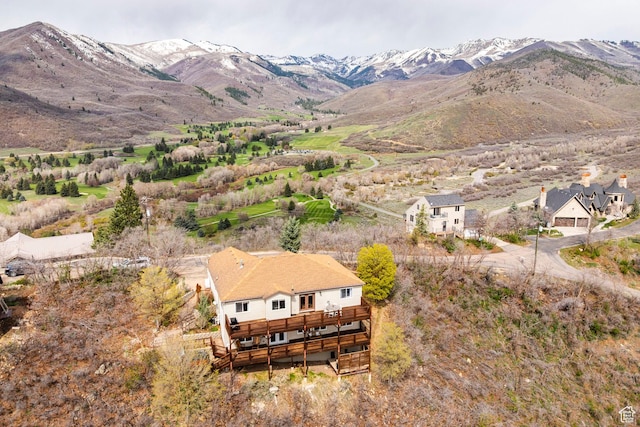 drone / aerial view featuring a mountain view