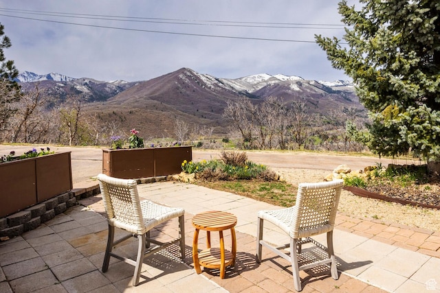 view of patio with a mountain view