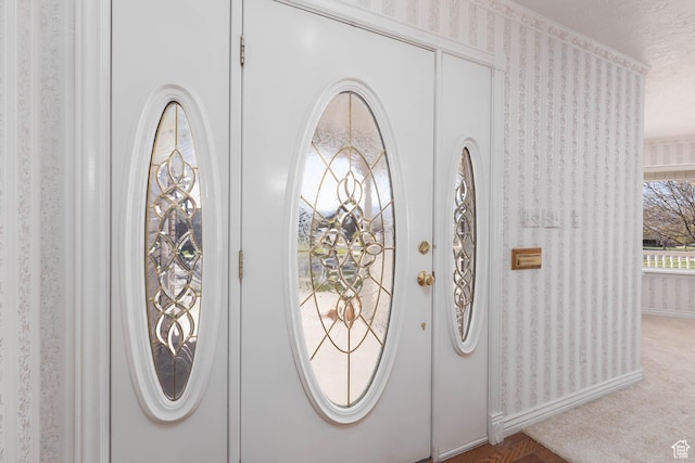 889 Upland Dr, Richfield, UT 84701 - entrance foyer with wallpapered walls and baseboards