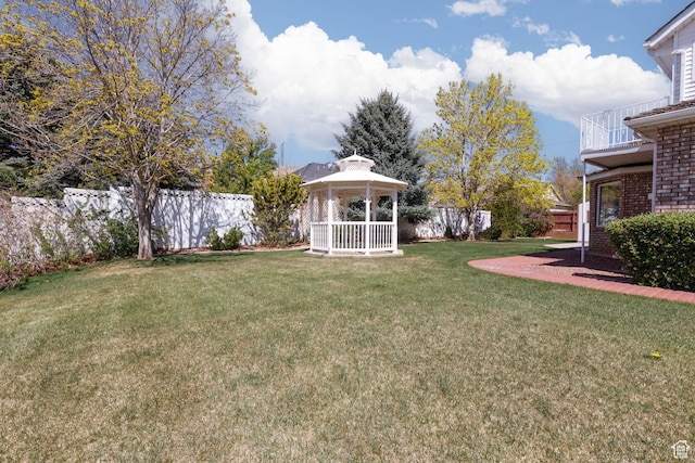 889 Upland Dr, Richfield, UT 84701 - view of yard with a gazebo, a fenced backyard, and a balcony