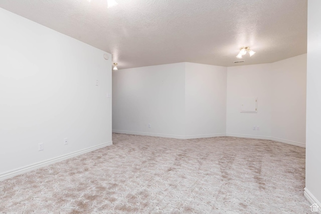 889 Upland Dr, Richfield, UT 84701 - empty room featuring baseboards, carpet floors, and a textured ceiling