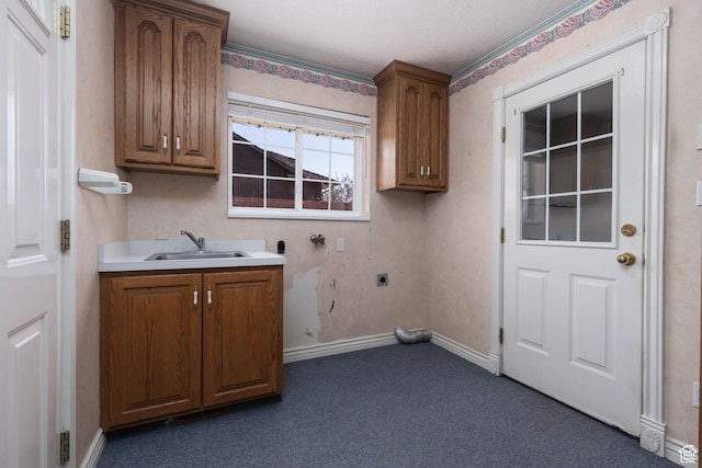 889 Upland Dr, Richfield, UT 84701 - laundry room featuring hookup for an electric dryer, a sink, cabinet space, dark carpet, and baseboards