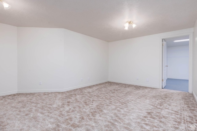 889 Upland Dr, Richfield, UT 84701 - carpeted spare room with a textured ceiling and baseboards