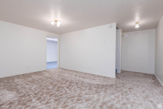 889 Upland Dr, Richfield, UT 84701 - carpeted empty room with a textured ceiling and baseboards