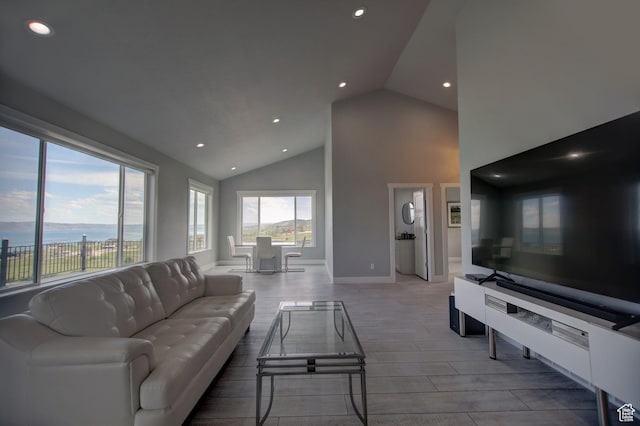 728 Loveland Ln, Fish Haven, ID 83287 - living room with baseboards, recessed lighting, wood finished floors, and high vaulted ceiling