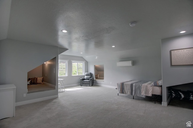 728 Loveland Ln, Fish Haven, ID 83287 - carpeted bedroom featuring recessed lighting, a wall mounted AC, vaulted ceiling, and baseboards