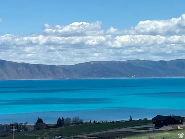 mountain view with a water view