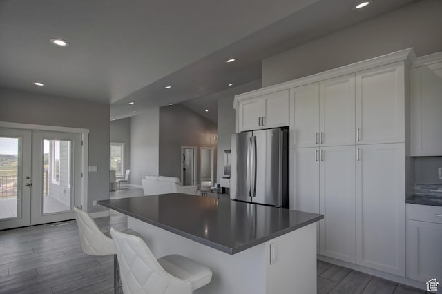 728 Loveland Ln, Fish Haven, ID 83287 - kitchen with light wood-style flooring, dark countertops, freestanding refrigerator, recessed lighting, and french doors