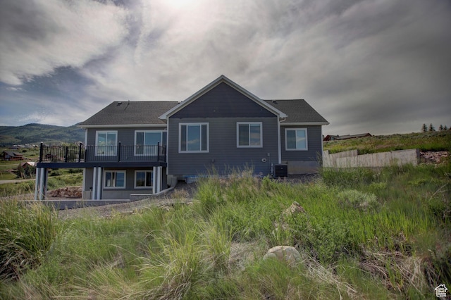 728 Loveland Ln, Fish Haven, ID 83287 - back of house with a deck and central AC unit