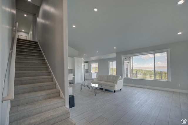 728 Loveland Ln, Fish Haven, ID 83287 - stairway featuring baseboards, recessed lighting, and wood finished floors