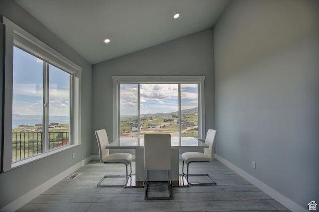 728 Loveland Ln, Fish Haven, ID 83287 - dining space with visible vents, recessed lighting, lofted ceiling, and plenty of natural light