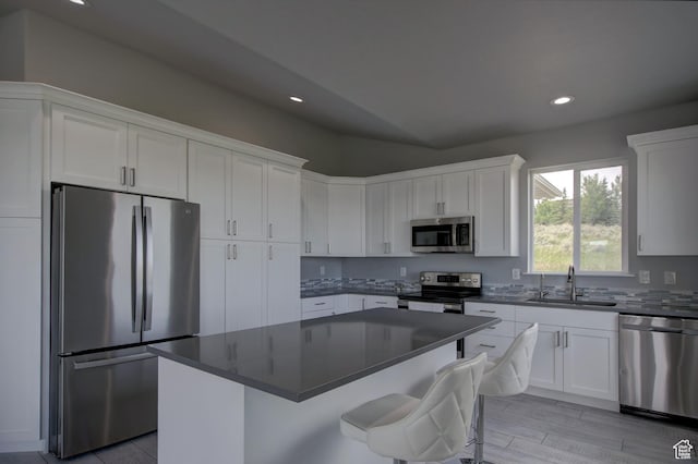 728 Loveland Ln, Fish Haven, ID 83287 - kitchen featuring white cabinetry, stainless steel appliances, recessed lighting, and a sink