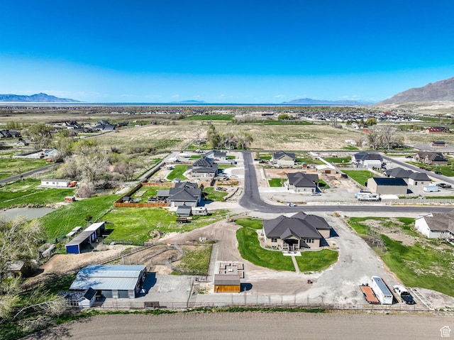 302 Old Farm Rd, Erda, UT 84074 - aerial view featuring a mountain view and a residential view