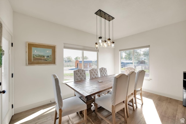 302 Old Farm Rd, Erda, UT 84074 - dining space with baseboards and light wood-style floors