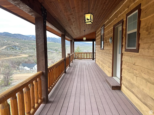 620 W Cisco Run Run, Garden City, UT 84028 - wooden deck with a mountain view and a porch