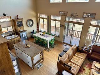 620 W Cisco Run Run, Garden City, UT 84028 - living area with a towering ceiling and wood finished floors