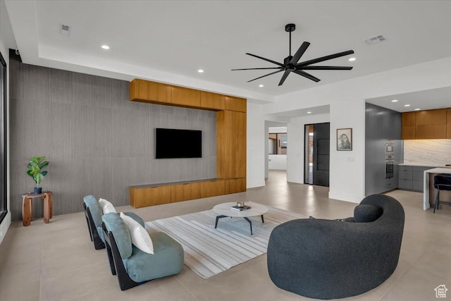 533 S Kwavasa Dr, Ivins, UT 84738 - living room with visible vents, an accent wall, ceiling fan, and recessed lighting