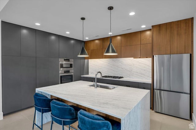 533 S Kwavasa Dr, Ivins, UT 84738 - kitchen featuring a sink, modern cabinets, and appliances with stainless steel finishes