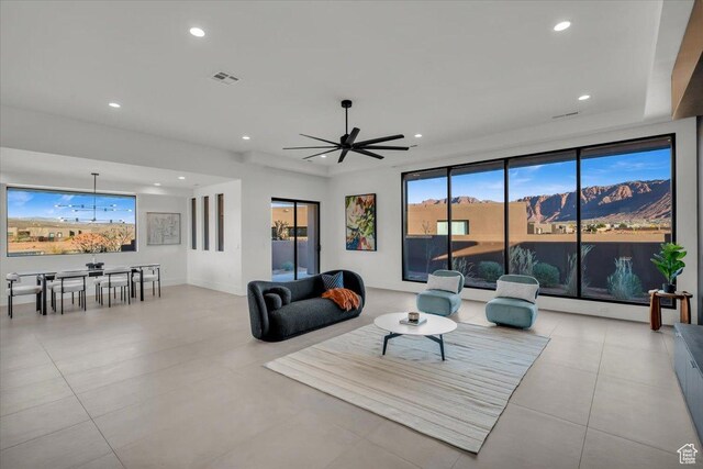 533 S Kwavasa Dr, Ivins, UT 84738 - living area with recessed lighting, ceiling fan, visible vents, baseboards, and tile patterned flooring