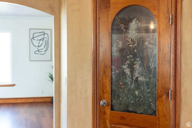 1910 E Canyon Ridge Dr, North Logan, UT 84341 - interior details featuring wood finished floors, baseboards, and arched walkways
