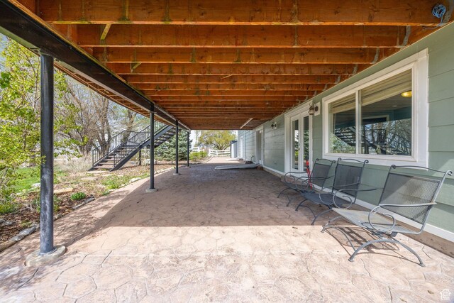 1910 E Canyon Ridge Dr, North Logan, UT 84341 - view of patio / terrace with stairway and french doors