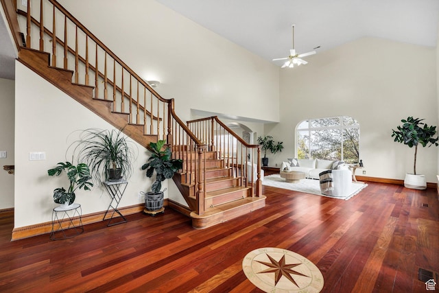 1910 E Canyon Ridge Dr, North Logan, UT 84341 - stairs with wood finished floors, ceiling fan, high vaulted ceiling, and baseboards