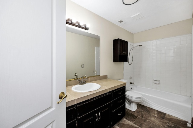 1910 E Canyon Ridge Dr, North Logan, UT 84341 - full bathroom featuring washtub / shower combination, vanity, toilet, and visible vents