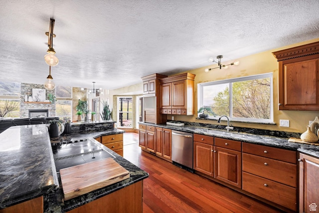1910 E Canyon Ridge Dr, North Logan, UT 84341 - kitchen featuring a textured ceiling, stainless steel dishwasher, dark wood-type flooring, and a sink