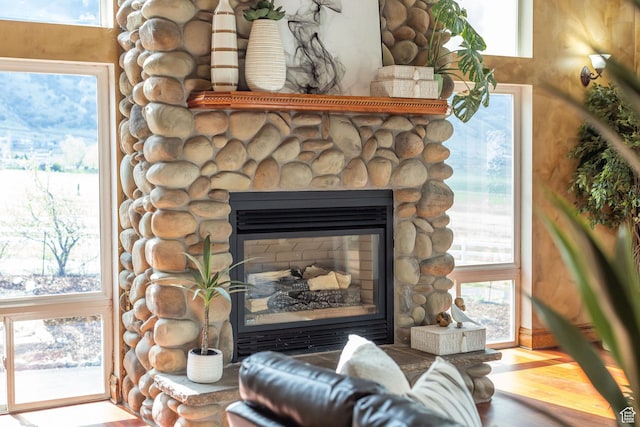 1910 E Canyon Ridge Dr, North Logan, UT 84341 - interior details featuring wood finished floors and a fireplace