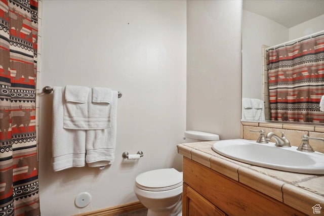 3634 N Huntsman Path Unit C201, Eden, UT 84310 - bathroom featuring toilet, curtained shower, and vanity