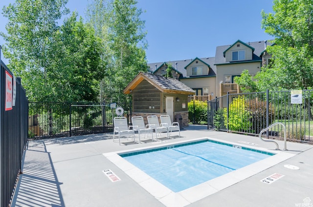3634 N Huntsman Path Unit C201, Eden, UT 84310 - view of pool featuring fence, a patio, and a swimming pool