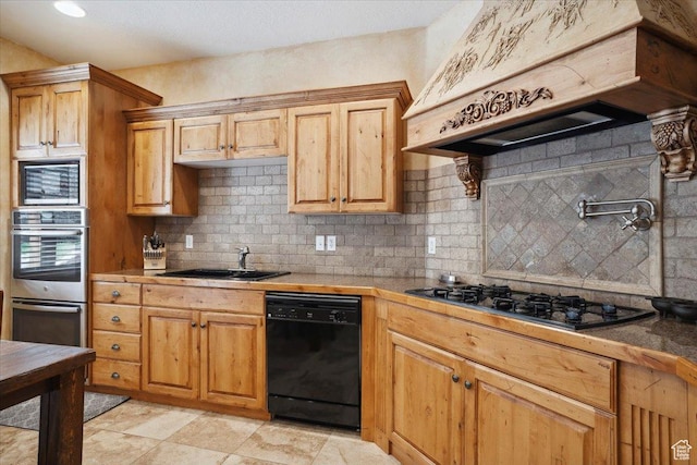 3634 N Huntsman Path Unit C201, Eden, UT 84310 - kitchen featuring appliances with stainless steel finishes, tasteful backsplash, premium range hood, and a sink