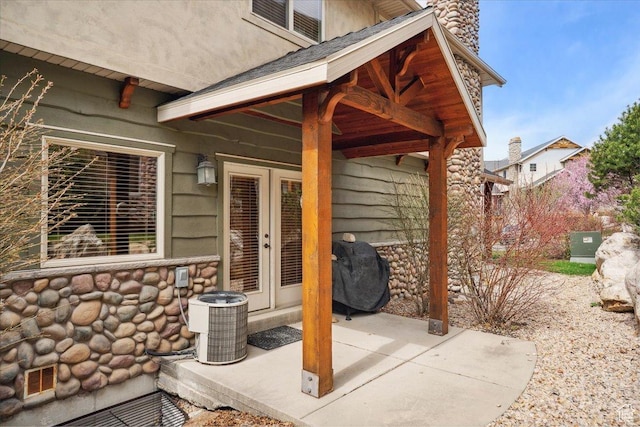 3634 N Huntsman Path Unit C201, Eden, UT 84310 - view of patio / terrace with central AC, french doors, and a grill