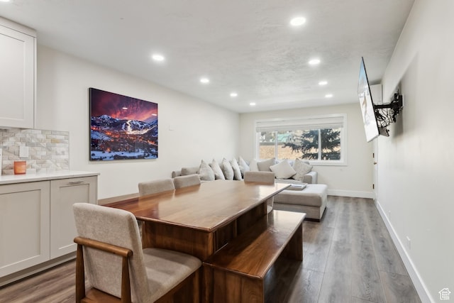 dining area with recessed lighting, wood finished floors, and baseboards