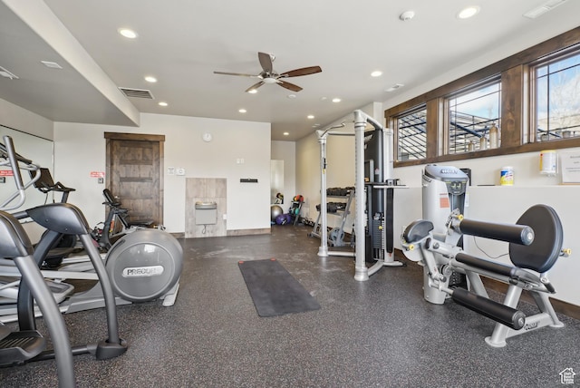 gym with visible vents, a ceiling fan, and recessed lighting