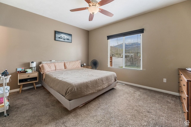 5454 N Windsor Way E, Stansbury Park, UT 84074 - carpeted bedroom with baseboards and a ceiling fan