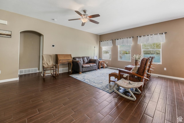 5454 N Windsor Way E, Stansbury Park, UT 84074 - living room with ceiling fan, wood finished floors, and arched walkways