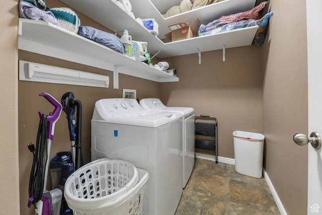 5454 N Windsor Way E, Stansbury Park, UT 84074 - laundry room featuring washing machine and dryer and stone finish floors