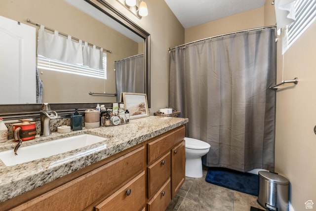 5454 N Windsor Way E, Stansbury Park, UT 84074 - bathroom featuring vanity and toilet